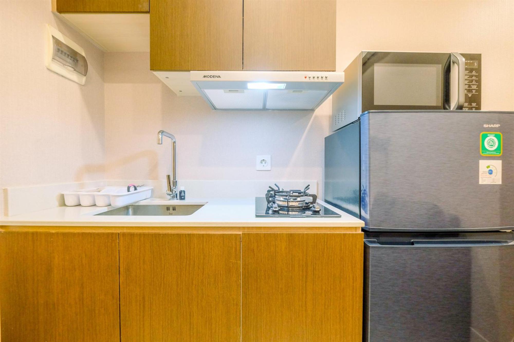 Apartemen Comfortable 1br At Gold Coast By Travelio